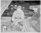 Mechanic in garage